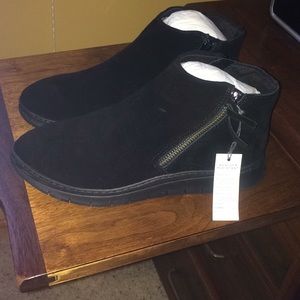 Black ankle boots. Water resistant.